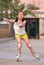 Girl practicing inline skating, Beijing, China